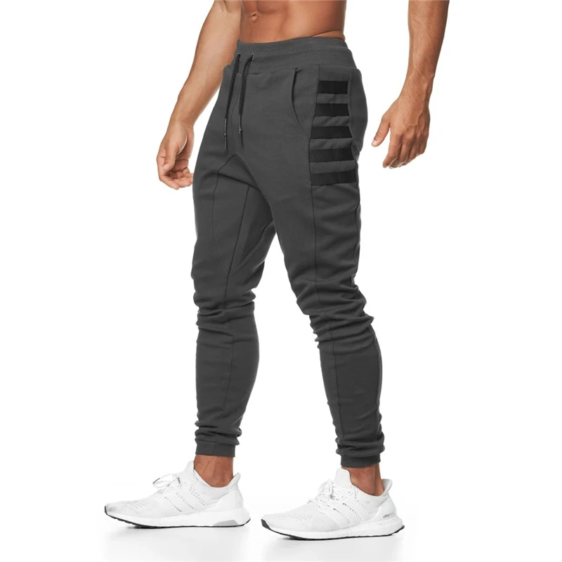 2021 Jogging Pants Men Sports Men's Jogger Fitness Trousers New Fashion Printed Muscle Mens Training
2021 Jogging Pants Men Sports Men's Jogger Fitness Trousers New Fashion Printed Muscle Mens Training