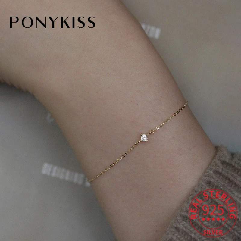Модные женские браслеты PONYKISS из стерлингового серебра 925 пробы с круглым Цирконом на цепочке из 14-каратного золота Изящные Ювелирные издели...
Модные женские браслеты PONYKISS из стерлингового серебра 925 пробы с круглым Цирконом на цепочке из 14-каратного золота Изящные Ювелирные издели...