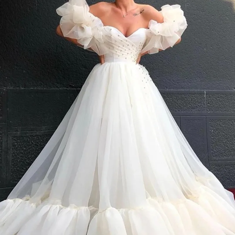 Elegant Organza Off shoulder A-Line Wedding Dress Beadings Sweetheart 2022 Short Sleeves Court Train Sexy Backless Bridal Gowns
Elegant Organza Off shoulder A-Line Wedding Dress Beadings Sweetheart 2022 Short Sleeves Court Train Sexy Backless Bridal Gowns