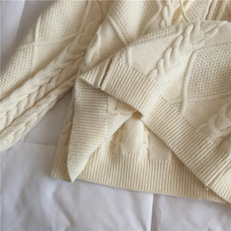 Autumn and winter women's sweater casual solid color cardigan loose hooded sweater 
Autumn and winter women's sweater casual solid color cardigan loose hooded sweater