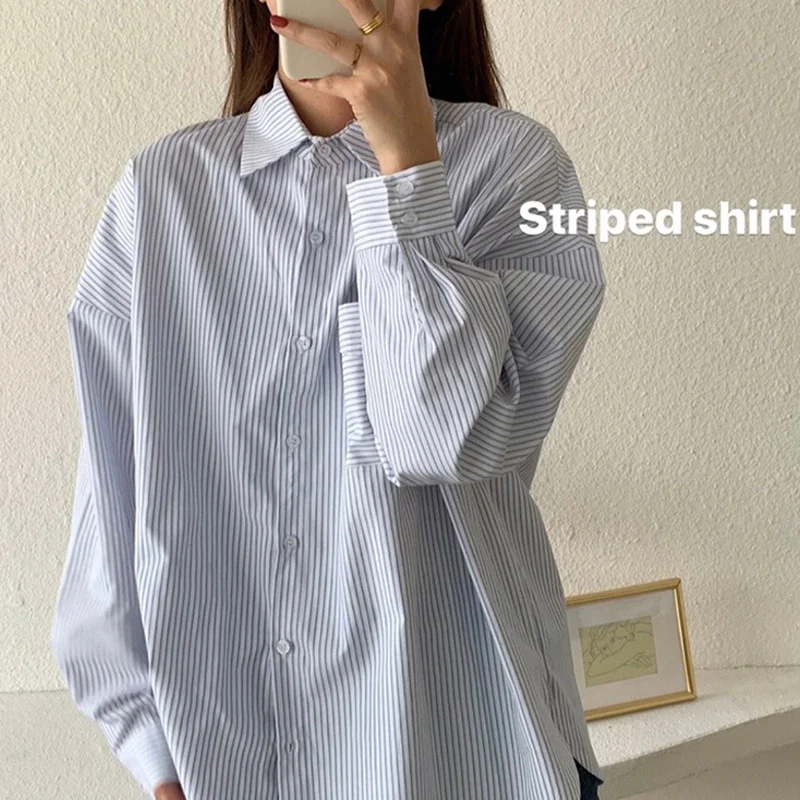 2021 early autumn top temperament long sleeve shirt women's spring autumn coat design sense blue stripe women's Rac
2021 early autumn top temperament long sleeve shirt women's spring autumn coat design sense blue stripe women's Rac