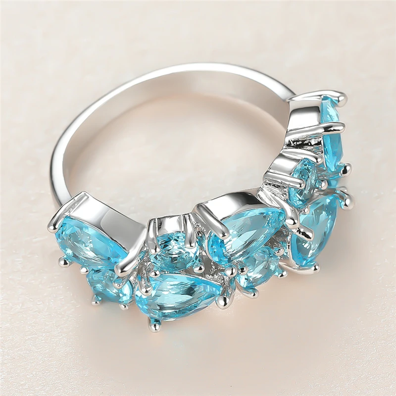 Cute Female Aqua Blue Crystal Stone Ring Charm Silver Color Wedding Rings For Women Promise Bride Water Drop Engagement Ring
Cute Female Aqua Blue Crystal Stone Ring Charm Silver Color Wedding Rings For Women Promise Bride Water Drop Engagement Ring
