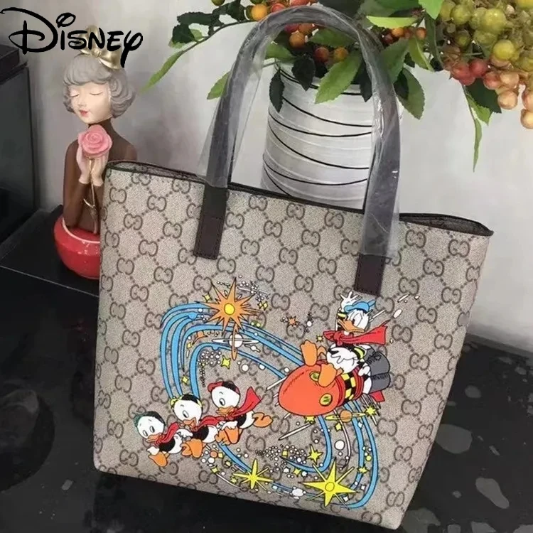 Disney Cartoon Donald Duck Fashion Trend Cartoon Pattern Shopping Bag Leisure Large Capacity Handbag Portable Handbag
Disney Cartoon Donald Duck Fashion Trend Cartoon Pattern Shopping Bag Leisure Large Capacity Handbag Portable Handbag