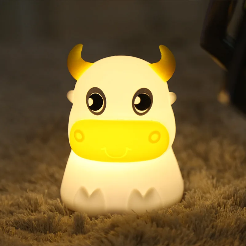 Cartoon cow LED night light touch sensor silicone lamp 7-color bedroom decoration bedside table lamp children's gift glowing toy
Cartoon cow LED night light touch sensor silicone lamp 7-color bedroom decoration bedside table lamp children's gift glowing toy