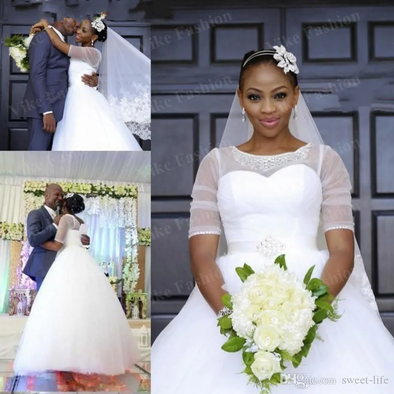 South African Plus Size Wedding Dress Sheer Neck Beaded Bride Dresses Half Sleeves Dubai Bridal Gowns 2021
South African Plus Size Wedding Dress Sheer Neck Beaded Bride Dresses Half Sleeves Dubai Bridal Gowns 2021