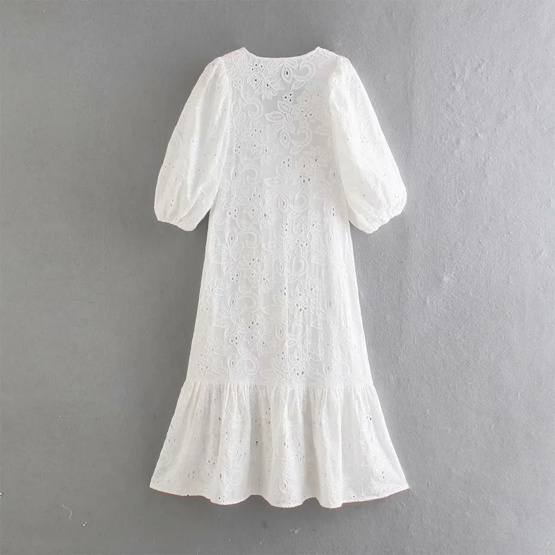 Summer women's casual solid color V-neck mid-length sleeve hollow embroidery dress
Summer women's casual solid color V-neck mid-length sleeve hollow embroidery dress
