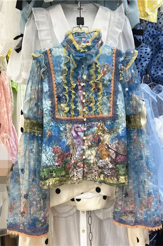 French Style Embroidery Elegant Retro Stand Collar Flare Sleeves Ruffled Patchwork Blue Blouse Printing Singl Breasted Shirt
French Style Embroidery Elegant Retro Stand Collar Flare Sleeves Ruffled Patchwork Blue Blouse Printing Singl Breasted Shirt