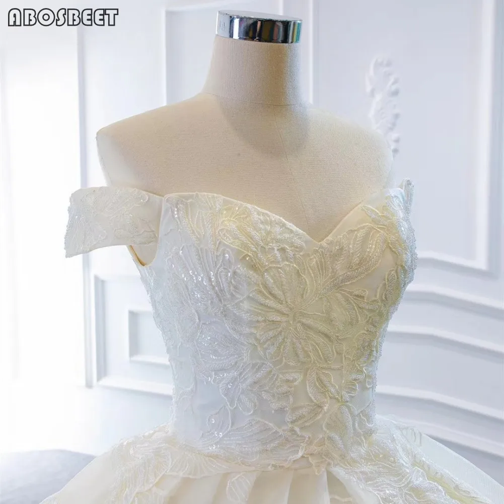 Ball Gown Off Shoulder Wedding Dress with Long Train 2021 Luxury Wedding Gown for Bridal Lace Up Back Vestido De Noiva
Ball Gown Off Shoulder Wedding Dress with Long Train 2021 Luxury Wedding Gown for Bridal Lace Up Back Vestido De Noiva