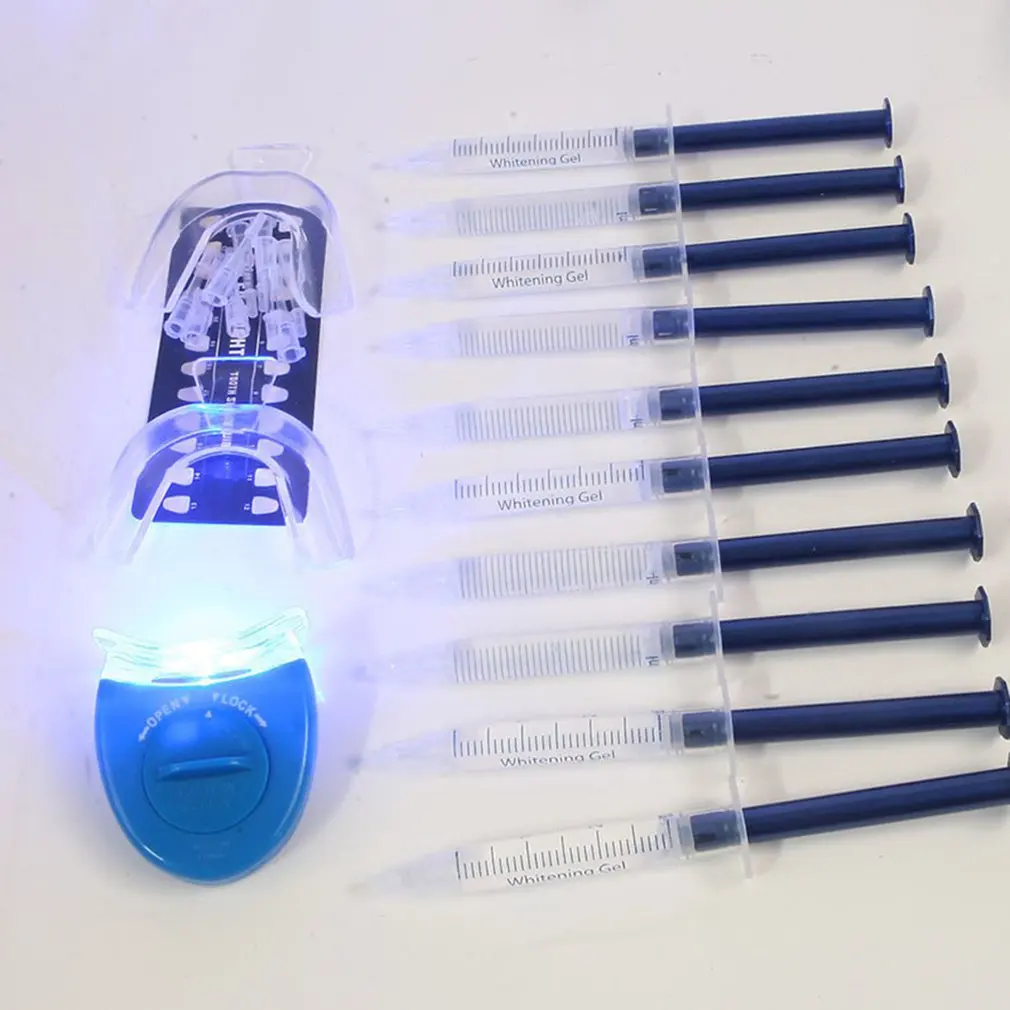 1 Set Dentist Teeth Whitening Peroxide Oral Hygiene Tool Kit 10pcs whitening gel+2pcs tray+1pc mini cold whitening light 
1 Set Dentist Teeth Whitening Peroxide Oral Hygiene Tool Kit 10pcs whitening gel+2pcs tray+1pc mini cold whitening light