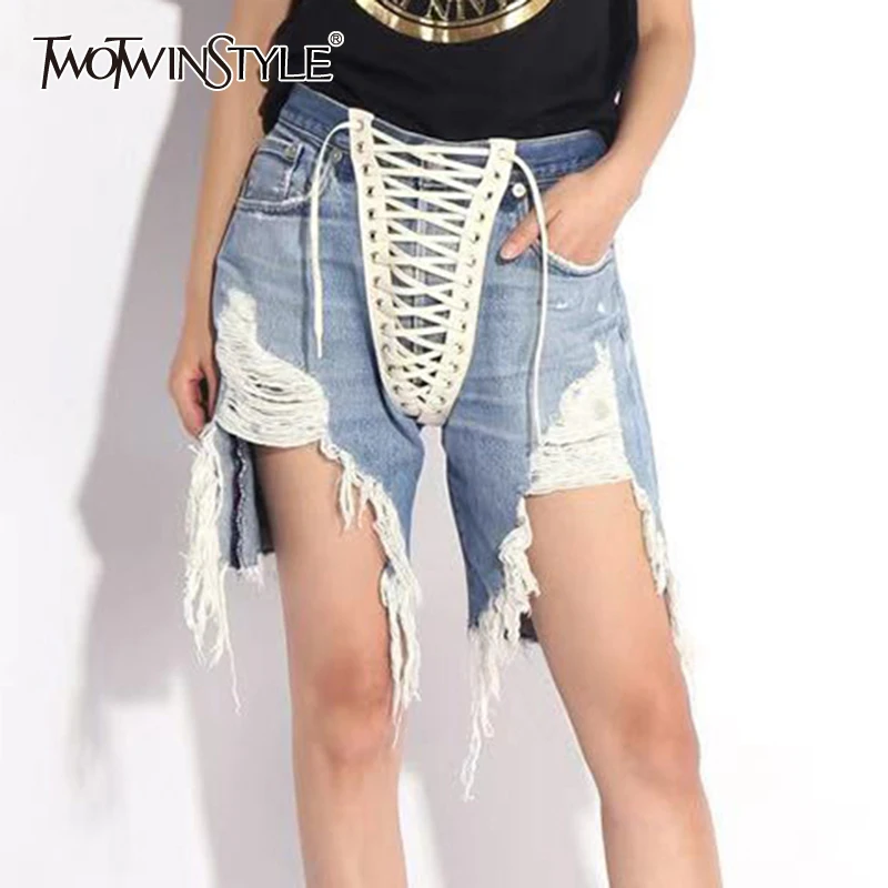 TWOTWINSTYLE Bandage Denim Short For Women High Waist Patchwork Tassel Sexy Casual Shorts Female Fashion New Clothing Summer
TWOTWINSTYLE Bandage Denim Short For Women High Waist Patchwork Tassel Sexy Casual Shorts Female Fashion New Clothing Summer