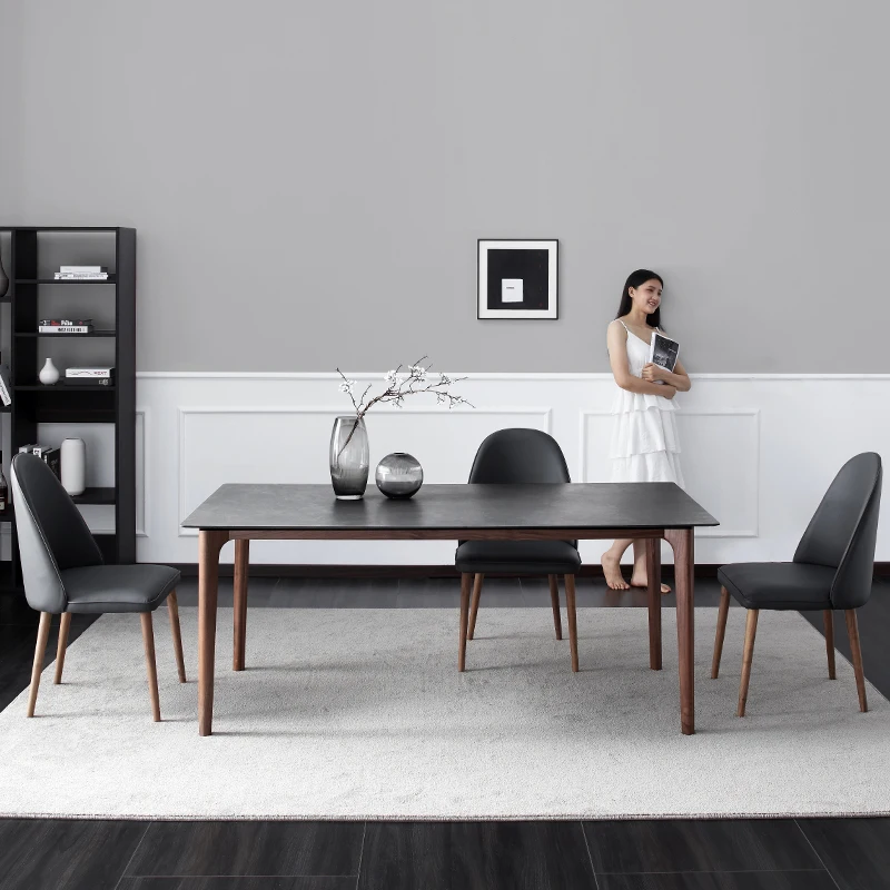 Black walnut Italian minimalist light luxury Nordic rock plate solid wood dining table 6 people simple modern
Black walnut Italian minimalist light luxury Nordic rock plate solid wood dining table 6 people simple modern
