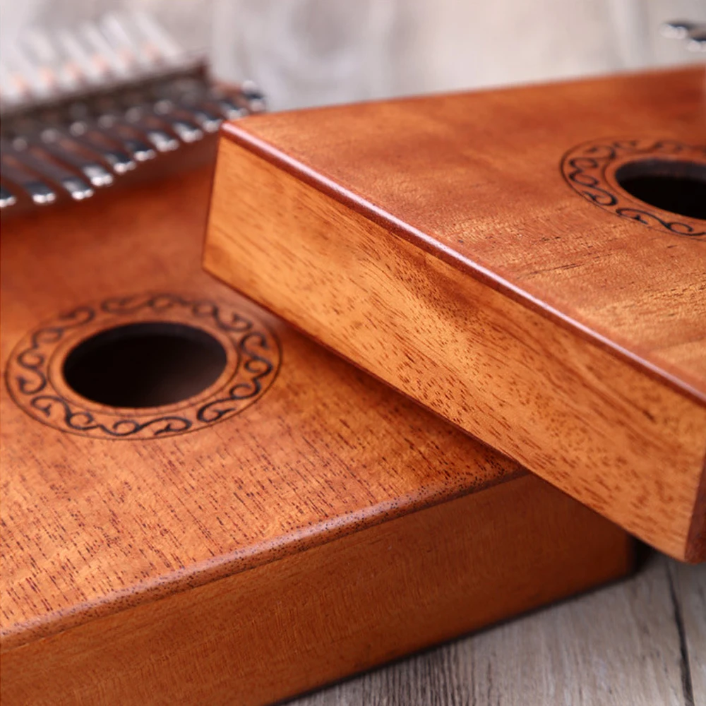 17 Keys Kalimba Thumb Piano High-Quality Wood Mahogany Body Musical Instrument Tune Hammer For Beginner Finger Piano
17 Keys Kalimba Thumb Piano High-Quality Wood Mahogany Body Musical Instrument Tune Hammer For Beginner Finger Piano