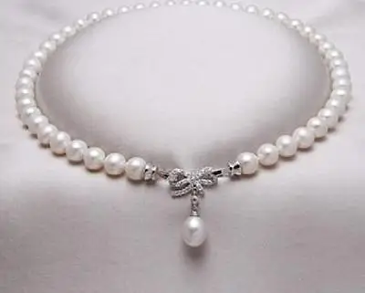 9-10mm south sea natural white pearl necklace 18" silver clasp 10*12mm pendant @
9-10mm south sea natural white pearl necklace 18" silver clasp 10*12mm pendant @