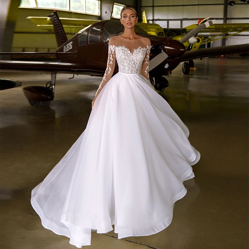 A-line Wedding Dress Charming Applique Beading Long Sleeve O-neck White Ivory Organza Bridal Gowns with Court Train
A-line Wedding Dress Charming Applique Beading Long Sleeve O-neck White Ivory Organza Bridal Gowns with Court Train