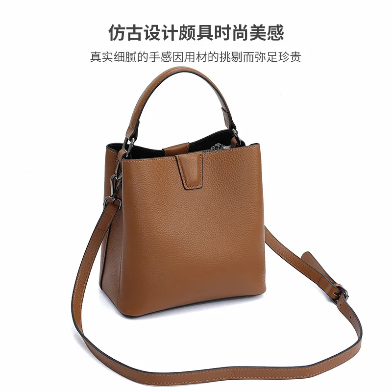 Large capacity Japanese and Korean single shoulder handbag fashion commuter minority large capacity TB real leather Bucket Bag 
Large capacity Japanese and Korean single shoulder handbag fashion commuter minority large capacity TB real leather Bucket Bag