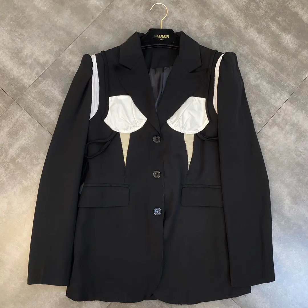 ZCSMLL 2021 autumn summer lapel long-sleeved black and white stitching cloth personality design sense of black suit jacket trend
ZCSMLL 2021 autumn summer lapel long-sleeved black and white stitching cloth personality design sense of black suit jacket trend