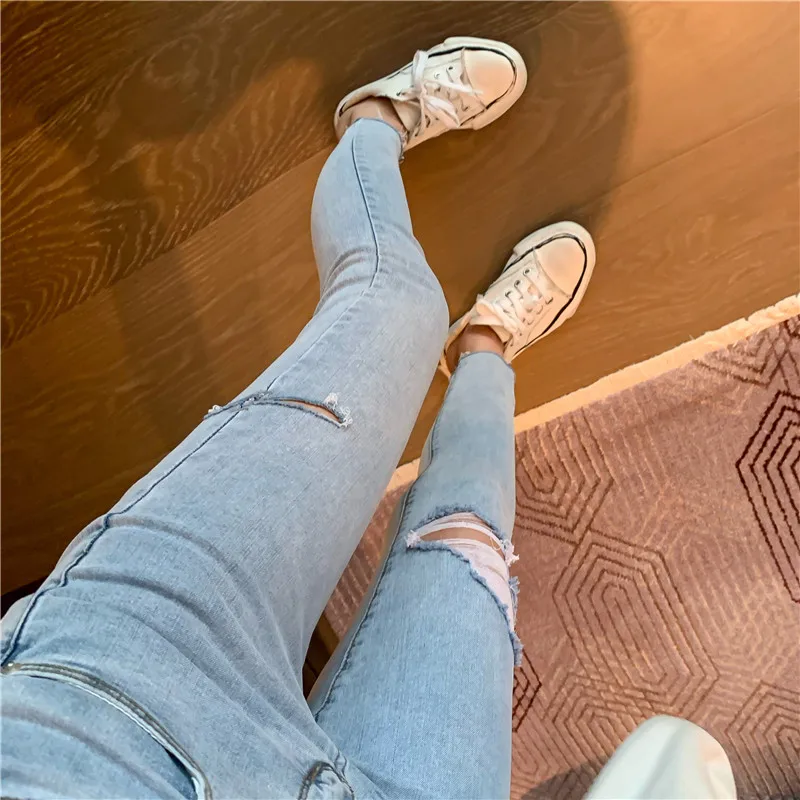Summer New Korean Style Ripped Cool Stretch Skinny Pencil Pants Women's Fashion High Waist All-Matching Cropped Jeans Fashion
Summer New Korean Style Ripped Cool Stretch Skinny Pencil Pants Women's Fashion High Waist All-Matching Cropped Jeans Fashion