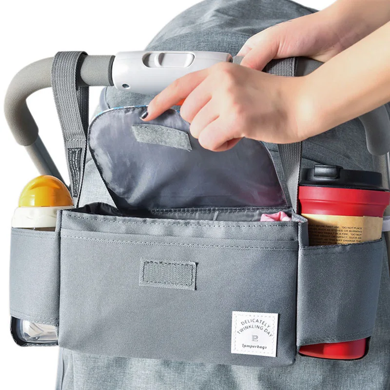 Baby Stroller Accessoris Bag New Cup Bag Stroller Organizer Baby Carriage Pram Buggy Cart Bottle Bag Car Bag Baby Accessories
Baby Stroller Accessoris Bag New Cup Bag Stroller Organizer Baby Carriage Pram Buggy Cart Bottle Bag Car Bag Baby Accessories