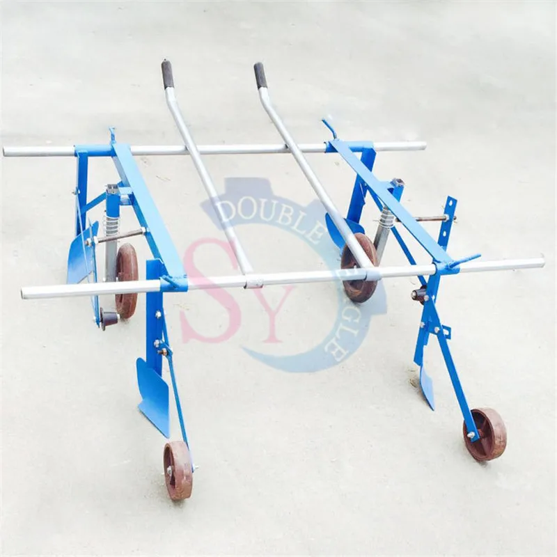 

Easy to operate agricultural hand pull plastic film covering laying machine/manual plastic mulch layer mulching Height 20cm 40cm
