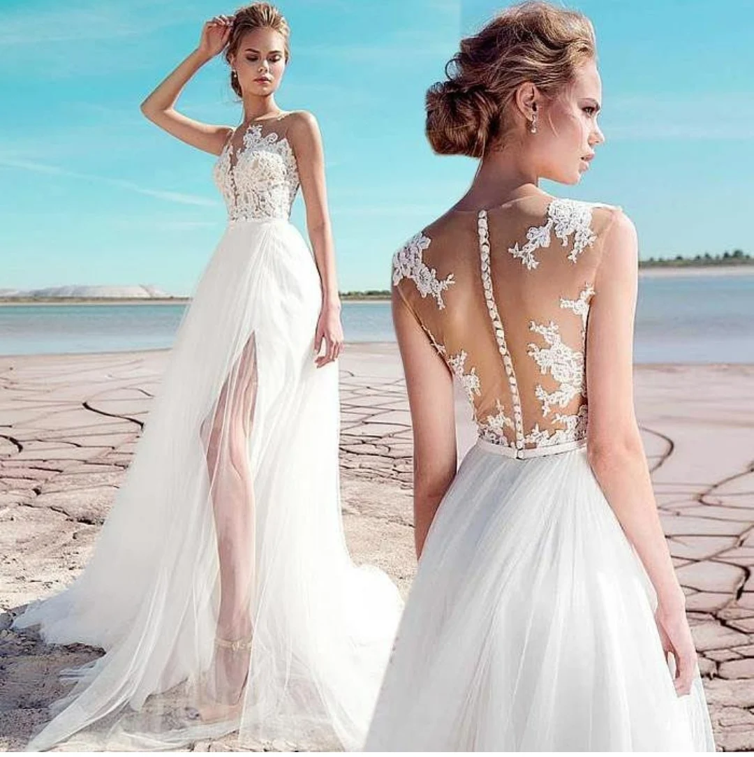 Elegant Long Lace Beach Wedding Dresses with Slit A-Line Illusion Back with Buttons Tulle Robes De Mariée Bridal Gown For Women
Elegant Long Lace Beach Wedding Dresses with Slit A-Line Illusion Back with Buttons Tulle Robes De Mariée Bridal Gown For Women