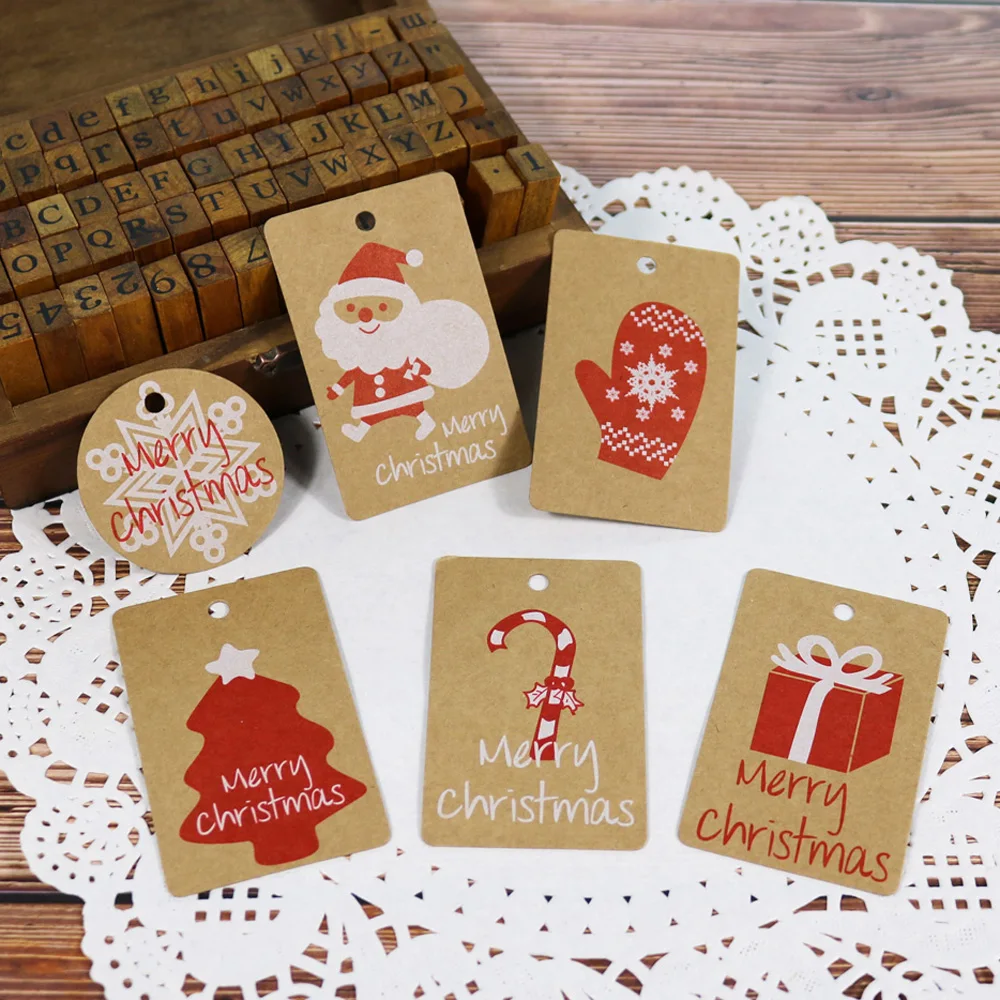 

50pcs Xmas Kraft Paper Tag Snowflake Santa Claus Gift Packaging Hang Tags Merry Christmas Gift Tag Party Candy Boxes Price Tags