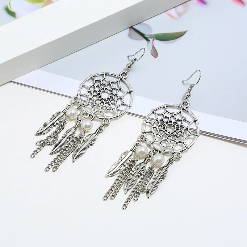 Ethnic bohemian dream catcher crystal beads feather earrings popular new chain leaf tassel earrings pearl hollow earrings
Ethnic bohemian dream catcher crystal beads feather earrings popular new chain leaf tassel earrings pearl hollow earrings
