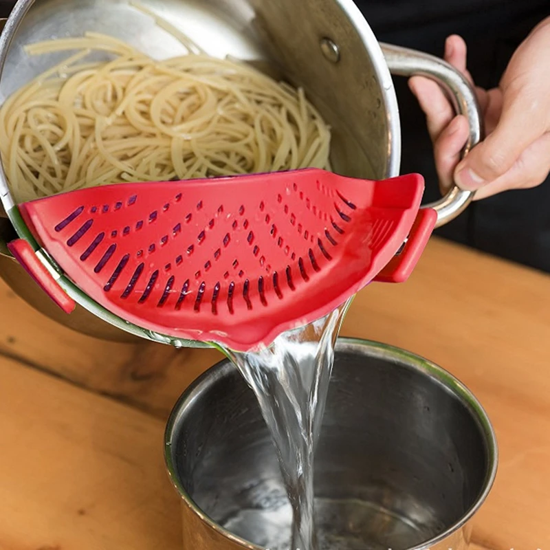 Kitchen supplies silicone pot side vegetable drainer vegetables pour household water filter noodles leak-proof drainer colander 
Kitchen supplies silicone pot side vegetable drainer vegetables pour household water filter noodles leak-proof drainer colander