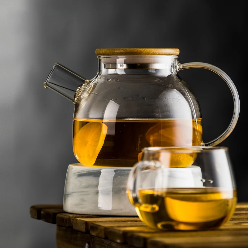 1000ML Borosilicate Glass Tea pot Heat Resistant Round Glass Teapot With Tea Infuser Filter Milk Oolong Flower Tea Pot
1000ML Borosilicate Glass Tea pot Heat Resistant Round Glass Teapot With Tea Infuser Filter Milk Oolong Flower Tea Pot