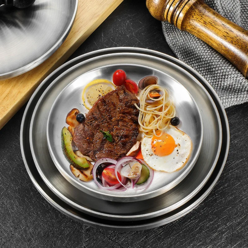304 stainless steel plate double insulated thickened European disc barbecue meat plate dessert Western food plate.
304 stainless steel plate double insulated thickened European disc barbecue meat plate dessert Western food plate.