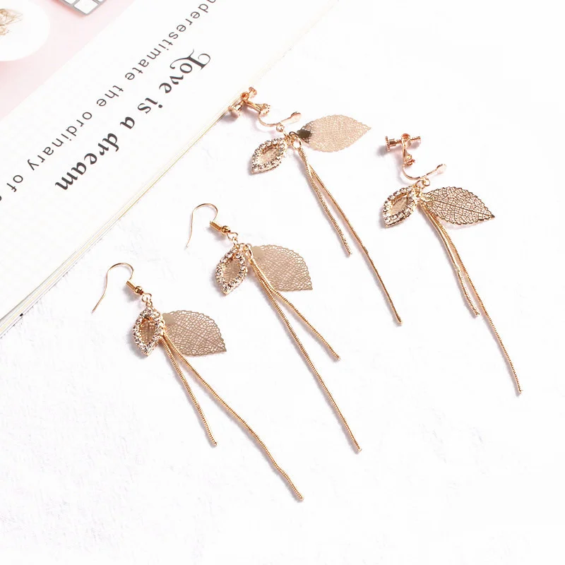 New Fashion Summer Sweet Forest Gold Hollow Leaf Diamond Girl Earrings Female Tassel Women Long Ear Clip Student Girlfriend Gift
New Fashion Summer Sweet Forest Gold Hollow Leaf Diamond Girl Earrings Female Tassel Women Long Ear Clip Student Girlfriend Gift