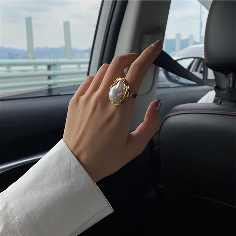 Fashion metal light luxury niche design geometry baroque pearl ring opening only beautiful women daily wear
Fashion metal light luxury niche design geometry baroque pearl ring opening only beautiful women daily wear