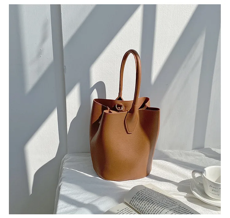 New Solid Color Small Women Handbag Korean Style Designer Ladies Bucket Bag PU Leather Female Shoulder Crossbody Bag Whole Sale
New Solid Color Small Women Handbag Korean Style Designer Ladies Bucket Bag PU Leather Female Shoulder Crossbody Bag Whole Sale