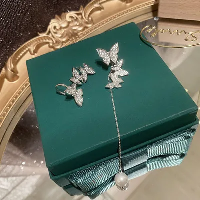 Asymmetric butterfly earrings with three-dimensional long pearl tassels S925 silver needle integrated ear bone clip earrings
Asymmetric butterfly earrings with three-dimensional long pearl tassels S925 silver needle integrated ear bone clip earrings