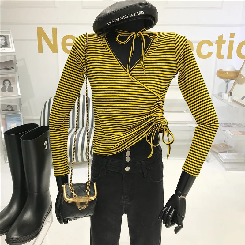 Women Spring Summer Niche Design Fashion Striped V-Neck Long Sleeve Short T-shirt Personalized Cross Drawstring Bottom Shirt 
Women Spring Summer Niche Design Fashion Striped V-Neck Long Sleeve Short T-shirt Personalized Cross Drawstring Bottom Shirt
