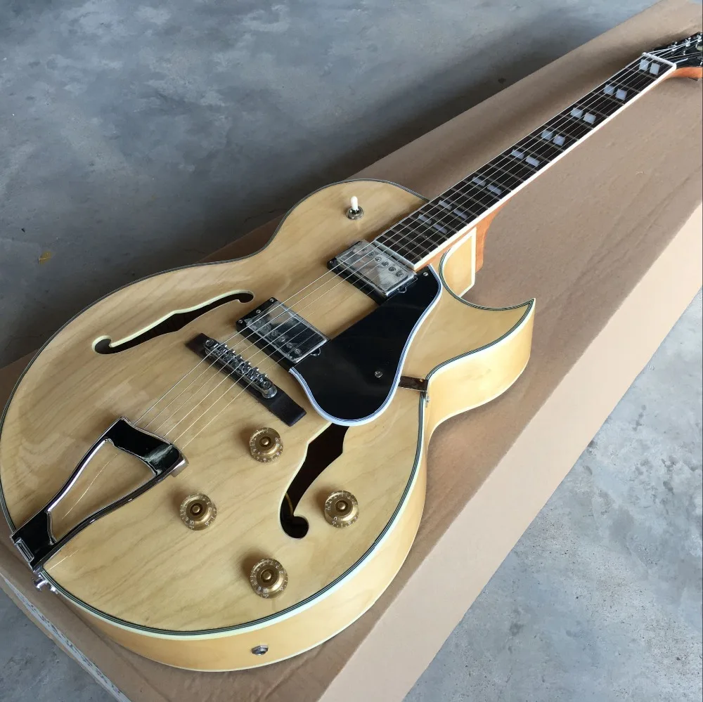 New standard Custom F hollow body jazz electric guitar, Natural wood color guitarra,musical instruments.vibrato system
New standard Custom F hollow body jazz electric guitar, Natural wood color guitarra,musical instruments.vibrato system