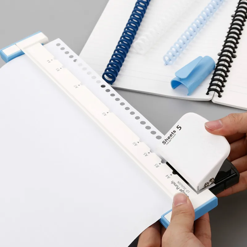 Multifunctional A4 paper 30-hole punch/ B5 26-hole/ A5 20-hole loose-leaf punch with ruler stationery office supplies
Multifunctional A4 paper 30-hole punch/ B5 26-hole/ A5 20-hole loose-leaf punch with ruler stationery office supplies
