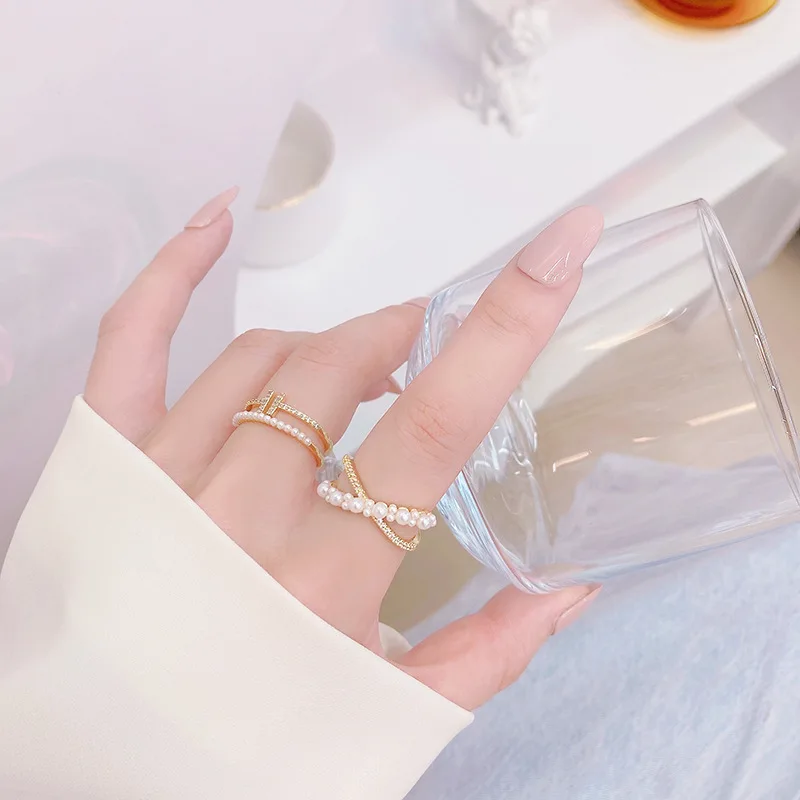 Fashion Korean 14K Real Gold Micro Inlaid CZ Open Design T Double layer pearl Ring for Women AAA Bling Zirconia anillos mujer
Fashion Korean 14K Real Gold Micro Inlaid CZ Open Design T Double layer pearl Ring for Women AAA Bling Zirconia anillos mujer