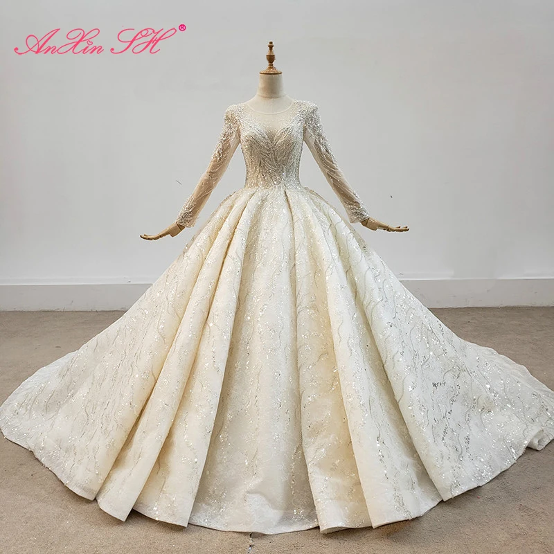 AnXin SH luxury princess beading crystal ball gown handmade o neck white flower lace long sleeve wedding dress 100% real photos
AnXin SH luxury princess beading crystal ball gown handmade o neck white flower lace long sleeve wedding dress 100% real photos