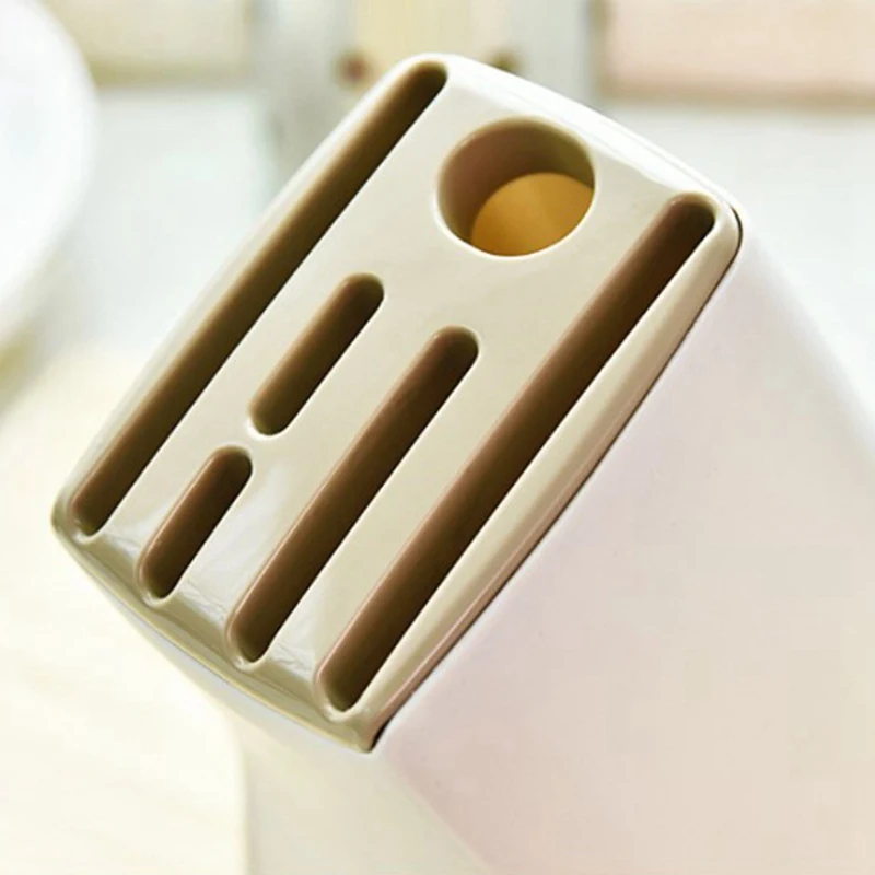 Knife Inserted Storage Rack Multifunctional Knife Storage Rack Light Drain Plastic Kitchen Household Knife Holder
Knife Inserted Storage Rack Multifunctional Knife Storage Rack Light Drain Plastic Kitchen Household Knife Holder