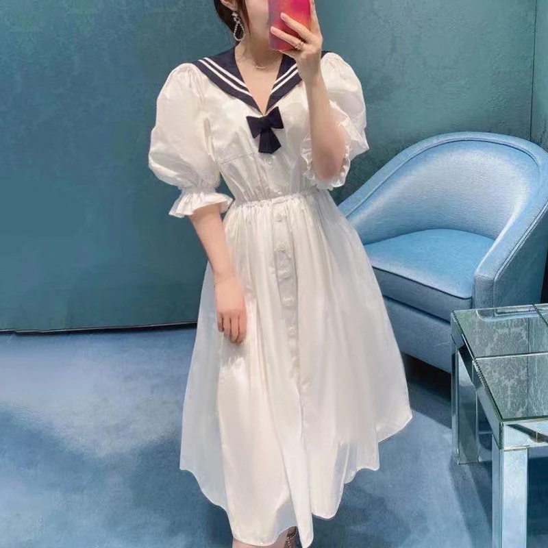 Летняя школьная одежда для женщин 2021, белые элегантные платья миди с бантом и пышными рукавами 
Летняя школьная одежда для женщин 2021, белые элегантные платья миди с бантом и пышными рукавами