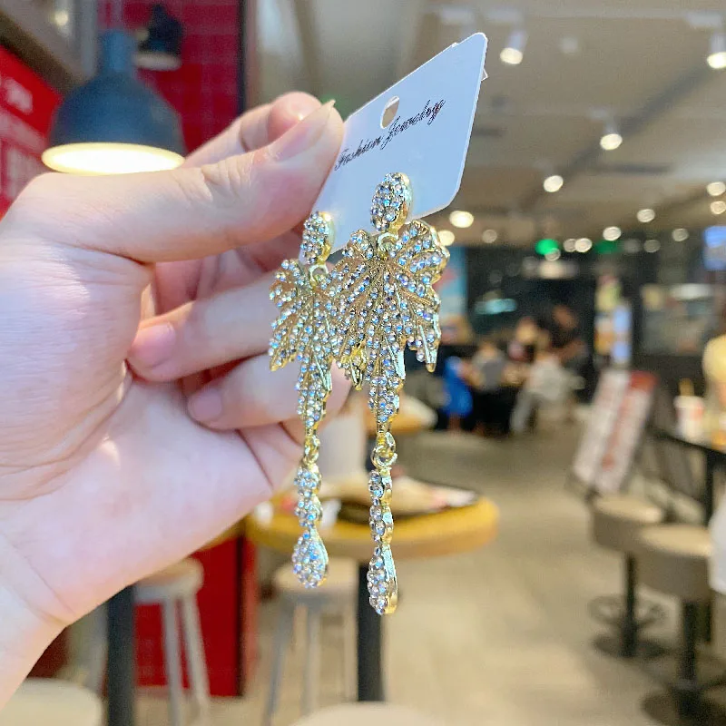 Серьги в европейском и американском стиле, роскошные со сверкающими бриллиантами и Кленовым листом, тонкие французские ретро серьги с круг... 
Серьги в европейском и американском стиле, роскошные со сверкающими бриллиантами и Кленовым листом, тонкие французские ретро серьги с круг...