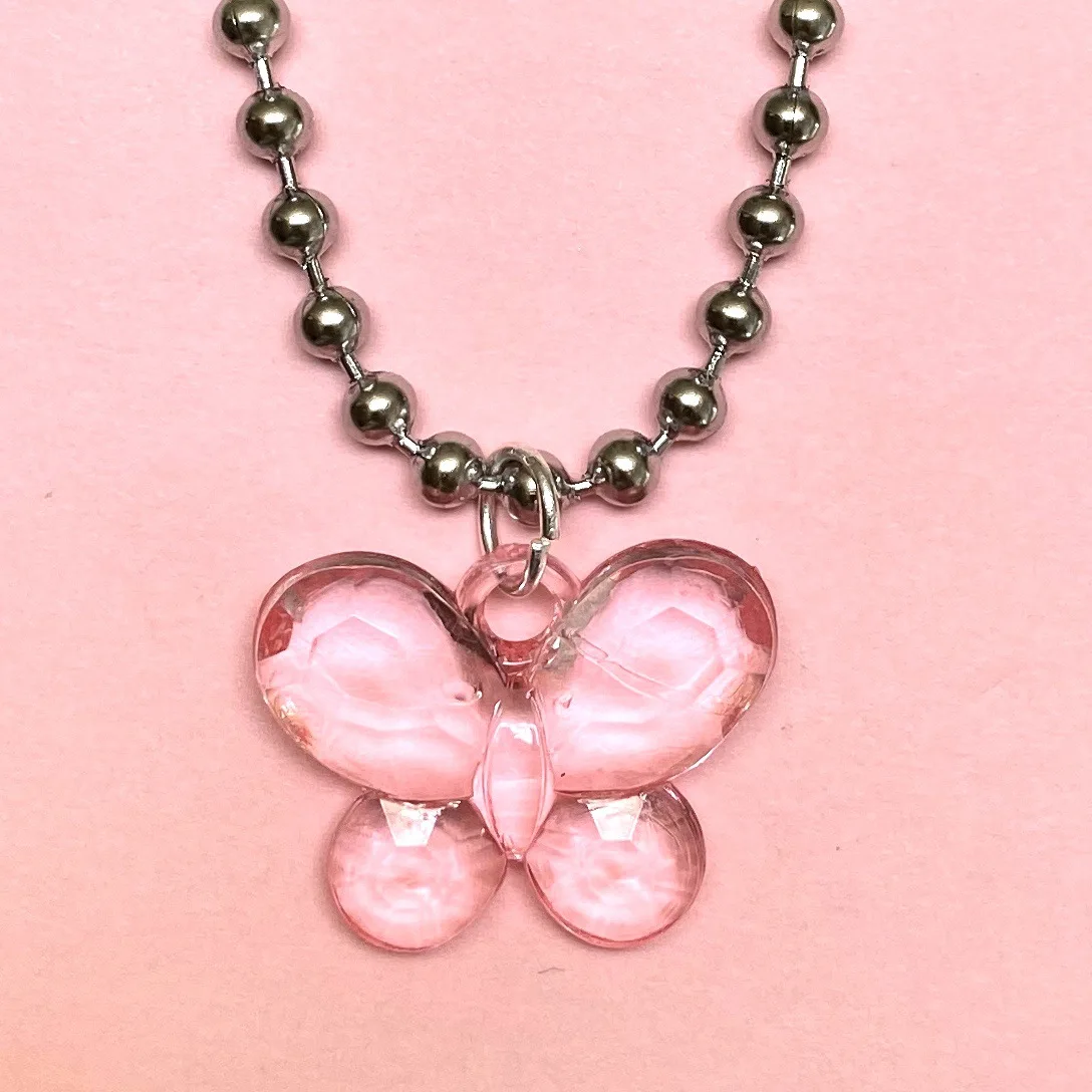 Instagram concave shape pink butterfly accessories personality dark pendant necklace female fashion
Instagram concave shape pink butterfly accessories personality dark pendant necklace female fashion