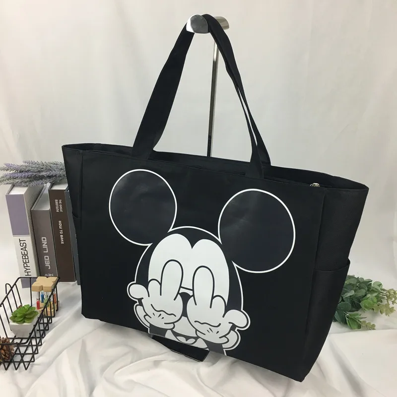 2021 Disney Anime Mickey Mouse Kawaii Women's Canvas Bag Shoulder High Capacity Portable Cartoon Bag for Shopping Handbag Purse 
2021 Disney Anime Mickey Mouse Kawaii Women's Canvas Bag Shoulder High Capacity Portable Cartoon Bag for Shopping Handbag Purse