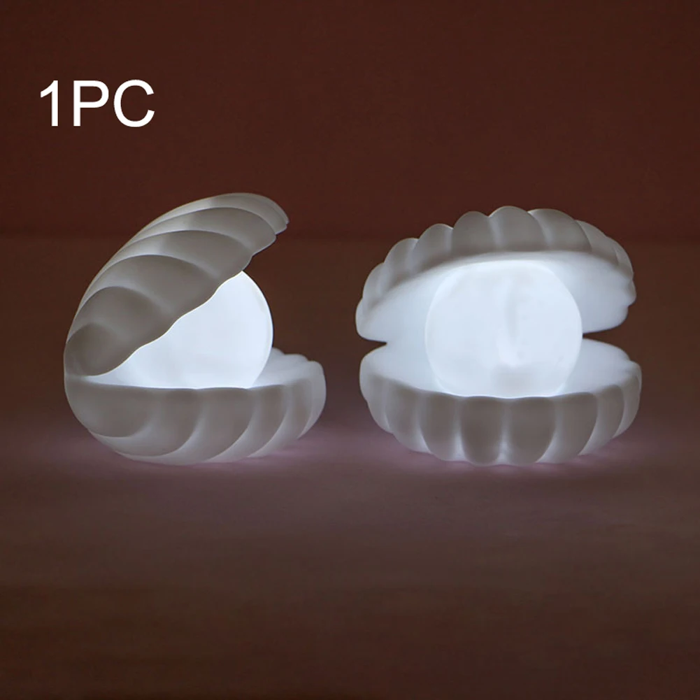 Modern Pearl Shell Night Light Vinyl Desktop LED Lighting Solid Multifunctional Bedroom Home Decor Battery Operated Bedside Lamp 
Modern Pearl Shell Night Light Vinyl Desktop LED Lighting Solid Multifunctional Bedroom Home Decor Battery Operated Bedside Lamp