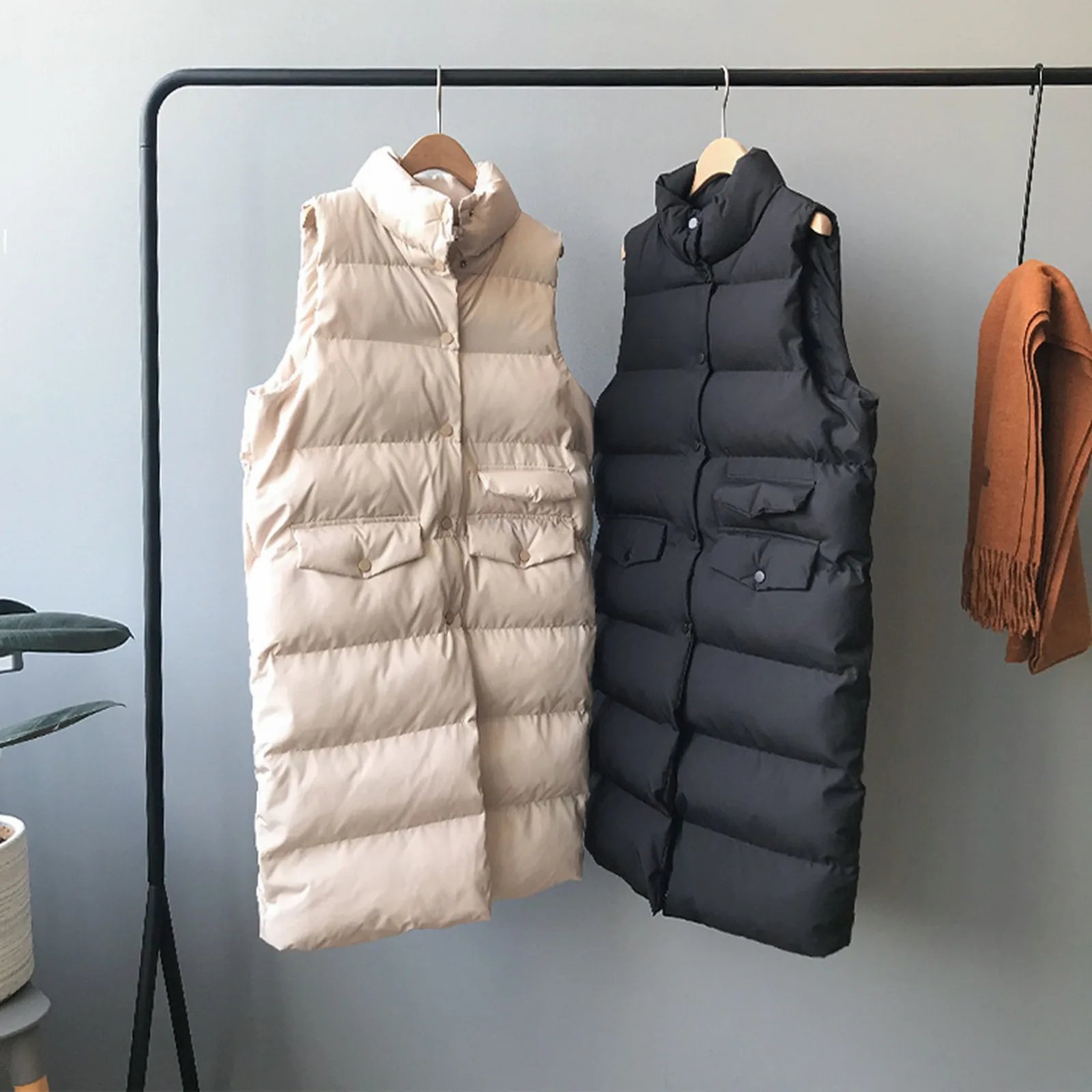 Women's Long Winter Coat Vest Sleeveless Warm Pockets Down Coat Vest Down Jacket Fashion Casual Quilted Outdoor Jacket Tops
Women's Long Winter Coat Vest Sleeveless Warm Pockets Down Coat Vest Down Jacket Fashion Casual Quilted Outdoor Jacket Tops