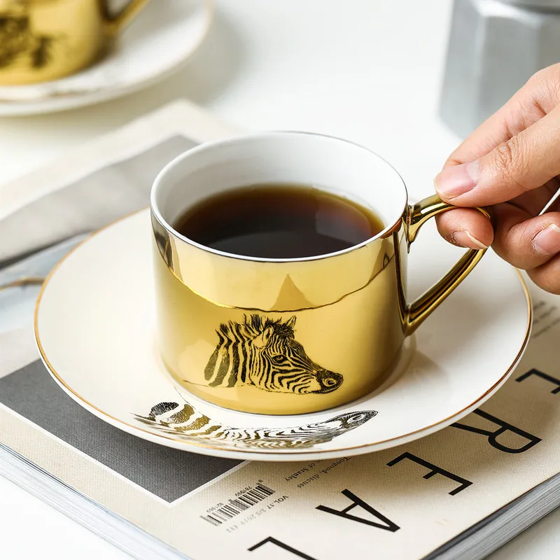250ml Ceramic Tea Cup And Saucer Set Creative Golden Design Porcelain Bone China Coffee Mug Breakfast Drinkware
250ml Ceramic Tea Cup And Saucer Set Creative Golden Design Porcelain Bone China Coffee Mug Breakfast Drinkware