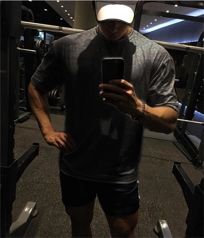 Men's Oversized T shirt Solid Color Gym Clothing Bodybuilding Fitness Loose Sportswear T-shirt Streetwear Hip-Hop Tshirt
Men's Oversized T shirt Solid Color Gym Clothing Bodybuilding Fitness Loose Sportswear T-shirt Streetwear Hip-Hop Tshirt