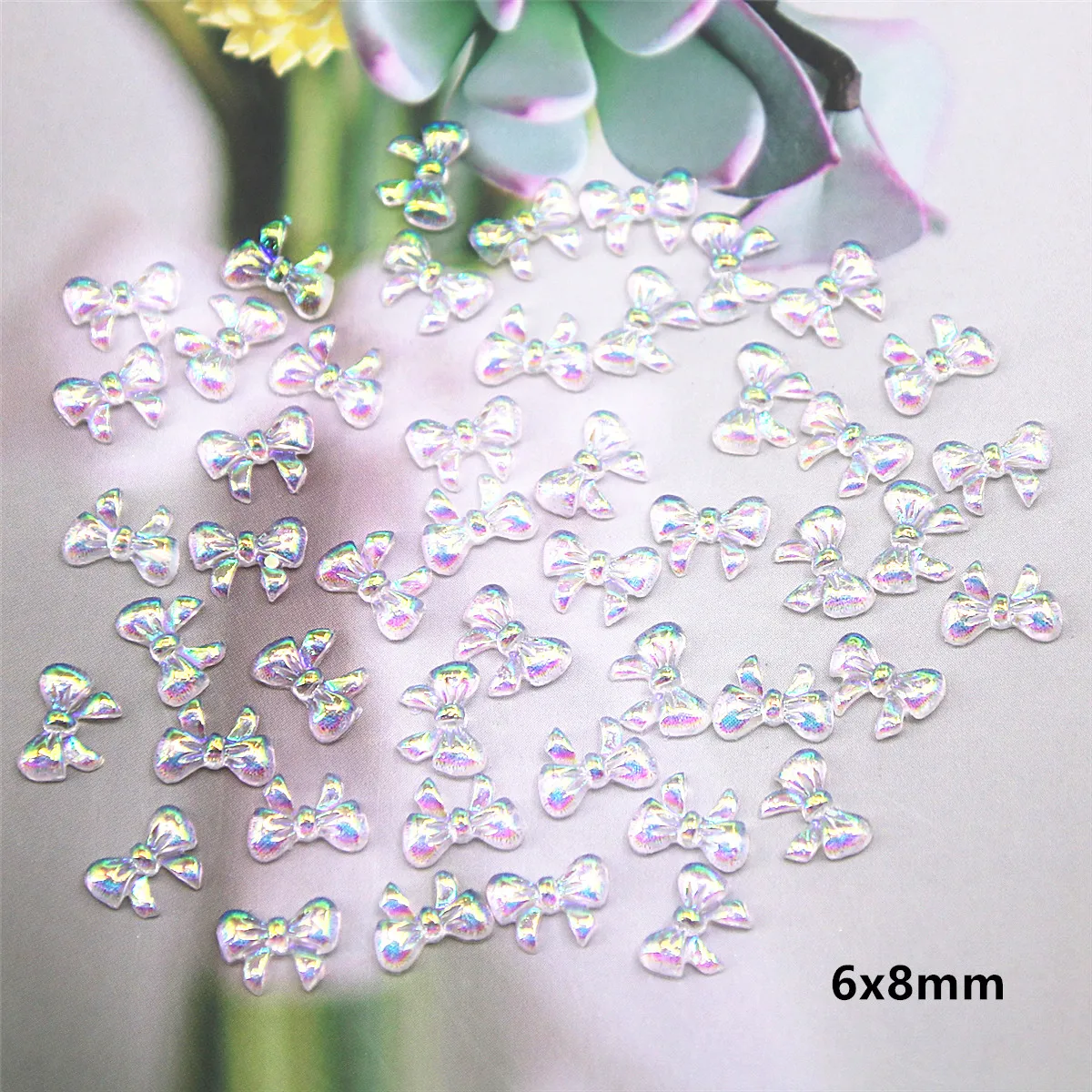 300pcs Cute Bowknot Resin Stones Nail Art Aurora Rhinestones Jelly Ornaments For Manicure Tips 6x8mm
300pcs Cute Bowknot Resin Stones Nail Art Aurora Rhinestones Jelly Ornaments For Manicure Tips 6x8mm