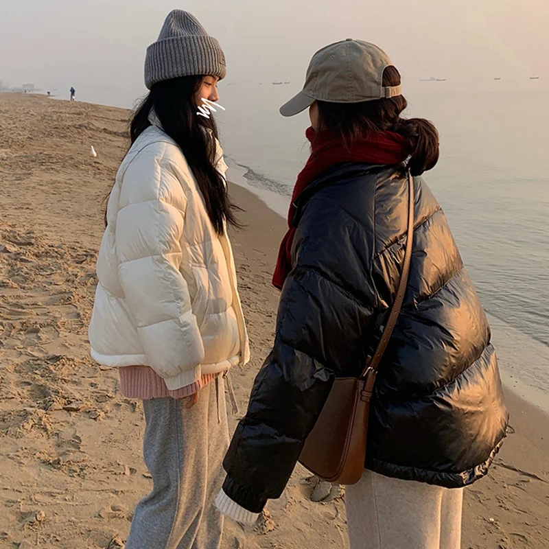 Short down padded jacket women 2021 new Korean version of the wild loose pearlescent stand-up collar winter jacket
Short down padded jacket women 2021 new Korean version of the wild loose pearlescent stand-up collar winter jacket