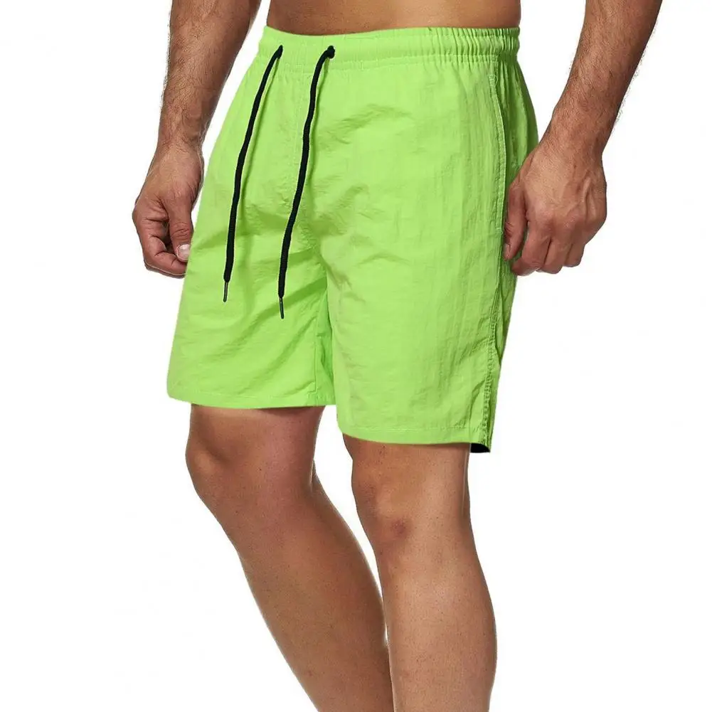 Men Knee Length Pockets Summer Shorts Elastic Waist Solid Color Quick Drying Wide Leg Drawstring Fitness Shorts Streetwear
Men Knee Length Pockets Summer Shorts Elastic Waist Solid Color Quick Drying Wide Leg Drawstring Fitness Shorts Streetwear